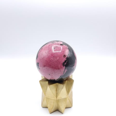 Rhodonite Sphere – A Crystal of Compassion, Balance &amp; Emotional Healing